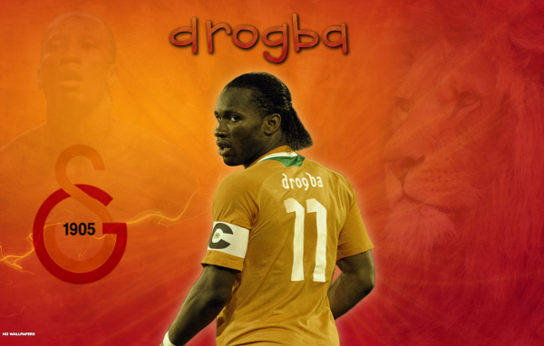 The forward of Galatasaray Didier Drogba on orange background