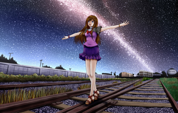 Девочка идет по рельсам