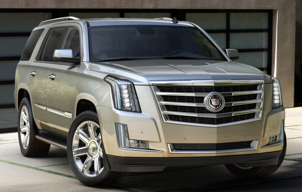 Золотистый Cadillac Escalade 2014