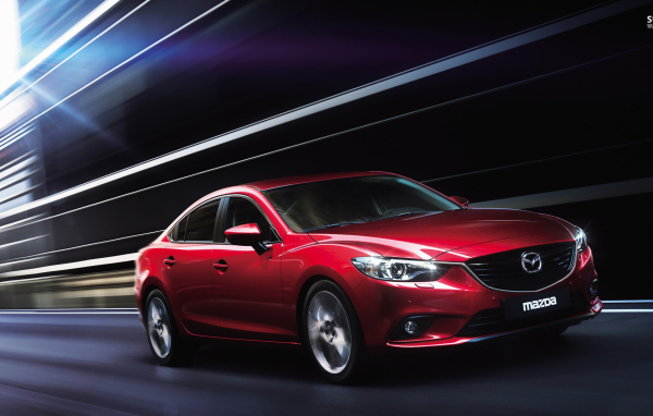 Надежная машина Mazda 3 2014