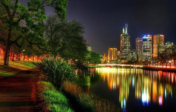 	   The lights of the city reflected in the river