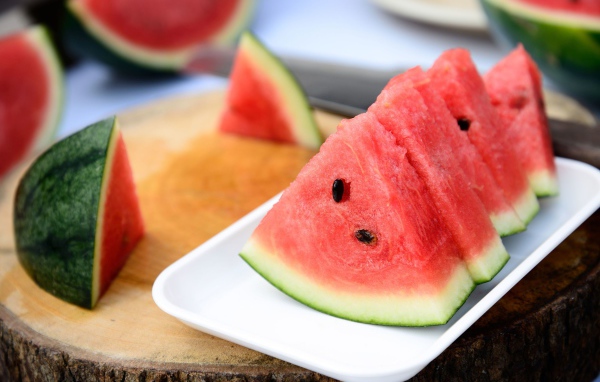 Plate of watermelon on a stump