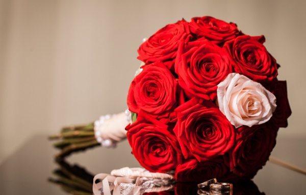 Red roses in a wedding bouquet