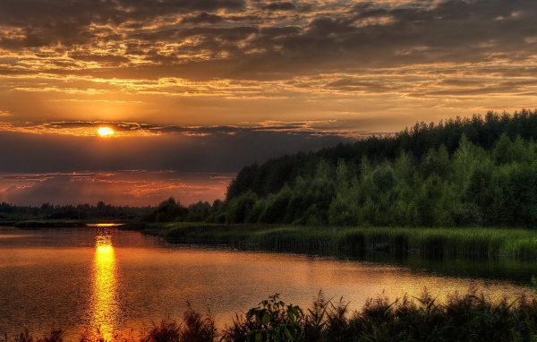 Закат солнца за тучу