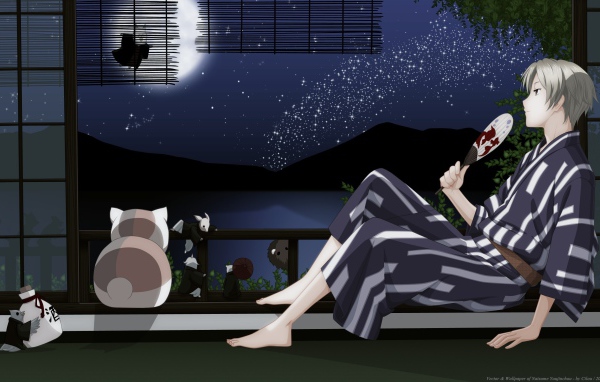 Парень и кот смотрят на луну