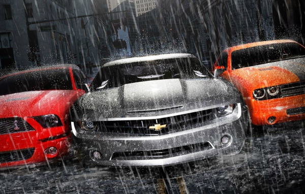 Мощные автомобили под дождем
