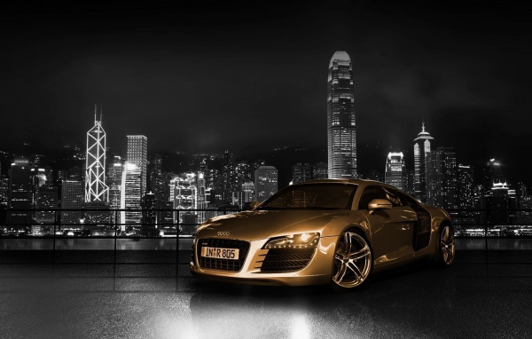 Golden Audi R10 on city background