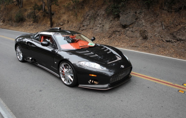 Black Spyker Ferrari on the road
