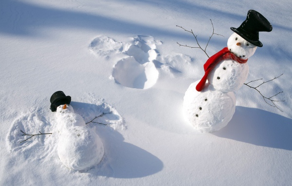 Snowmen make snow angels