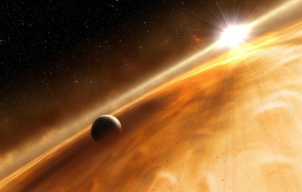 Планета пробивается сквозь туманность