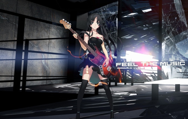 Девушка аниме Akiyama Mio с гитарой