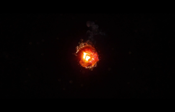 Горящий уголек, черный фон