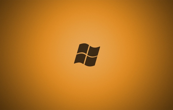 Серый логотип Майкрософт, оранжевый фон