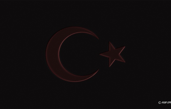 Красная луна и звезда на черном фоне