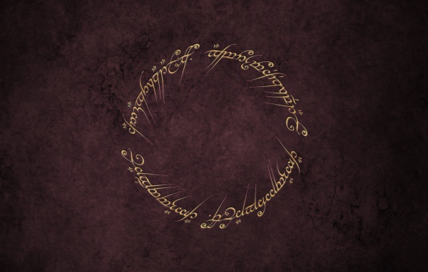 Надписи кольца всевластия на коричневом фоне