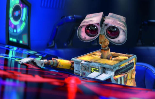 Робот WALL·E за пультом управления