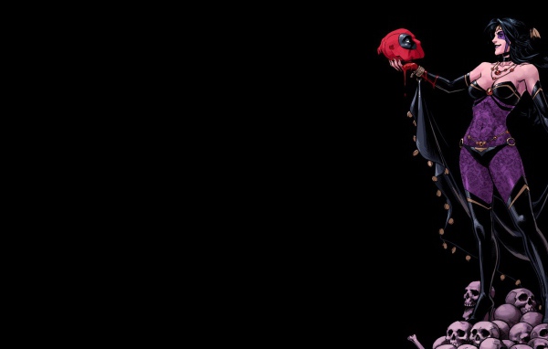 Девушка держит в руке голову Дэдпула