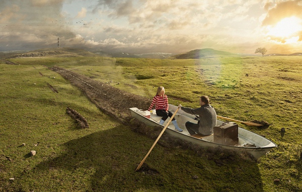 Двое в лодке среди поля