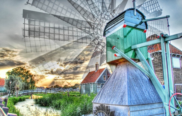 Вращение лопастей деревянной мельницы