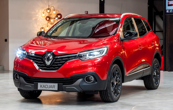 Красный автомобиль кроссовер Renault  Kadjar 