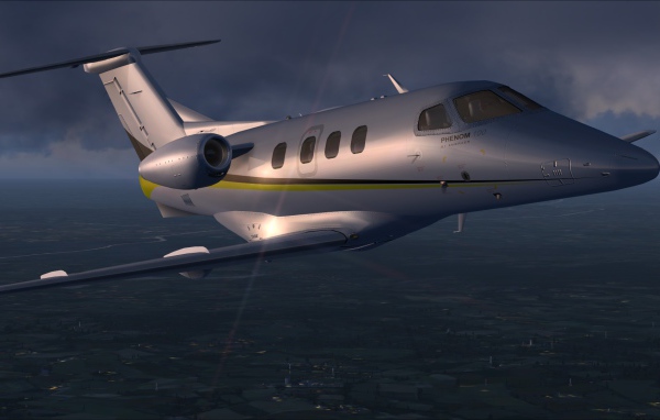 Embraer Phenom 100 в небе 