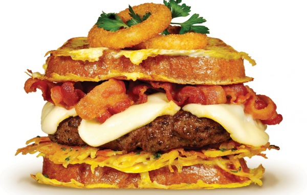 Сытный бургер с котлетой на белом фоне