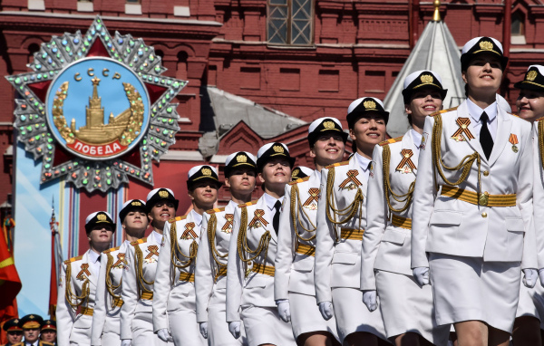 Girls in white military uniform on Victory Day parade on May 9