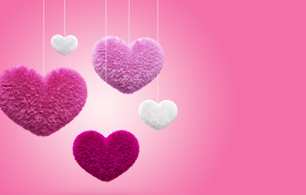 Мягкие пушистые сердечки на розовом фоне 