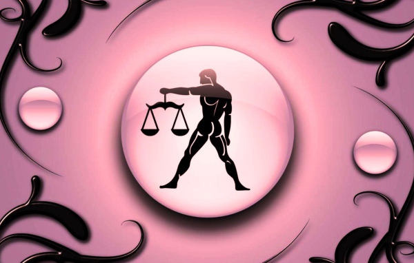 Знак зодиака Весы на  розовом фоне с чёрным орнаментом 