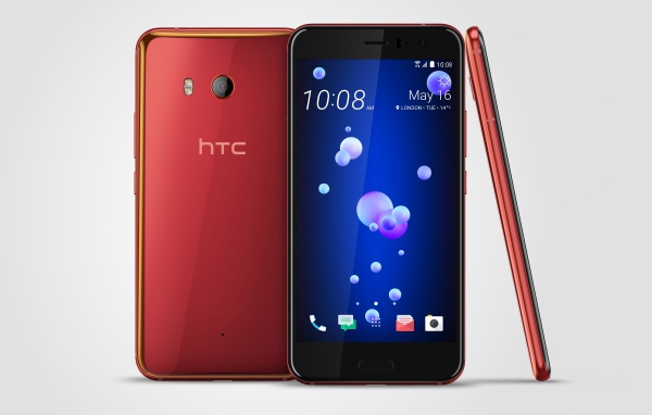 Стильные новинки смартфоны HTC U11 на сером фоне, 2017