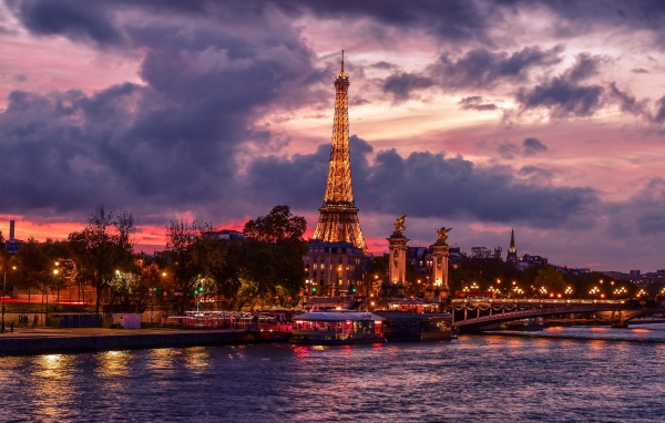 View of the Eiffel Tower at night under the beautiful sky, France