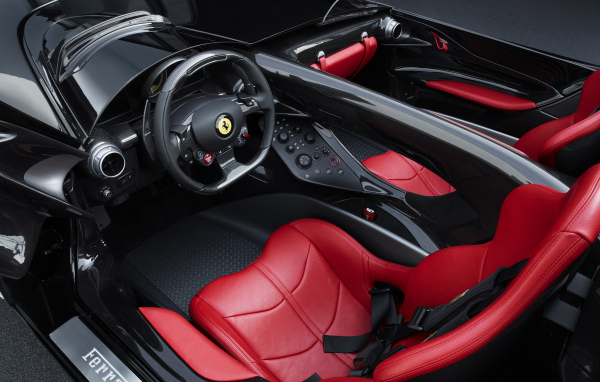 Стильный кожаный салон автомобиля ferrari monza