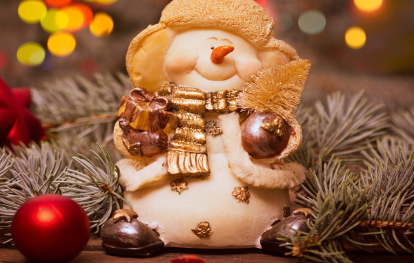 Christmas toy snowman with a fir branch for Christmas 2019