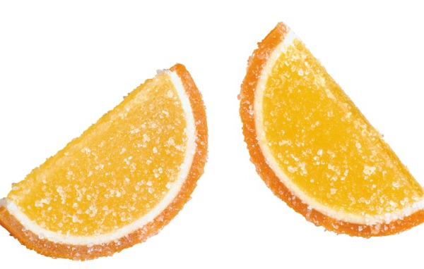 Две конфеты желе в сахаре на белом фоне