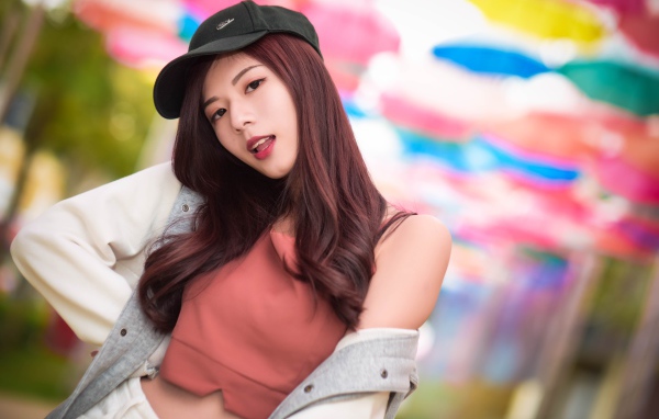 Asian girl in a black cap