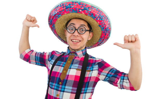 Cheerful guy with glasses and a big hat on a white background