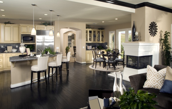 Красивая гостинная с кухней в пастельных тонах 