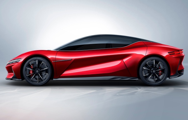 Красный автомобиль BYD E-SEED GT 2019 года на сером фоне