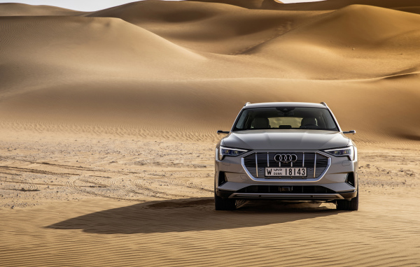 Silver car Audi E-Tron 55 Quattro 2019 in the desert