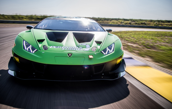 Green sports car Lamborghini Huracan GT3 EVO 2018 on the track