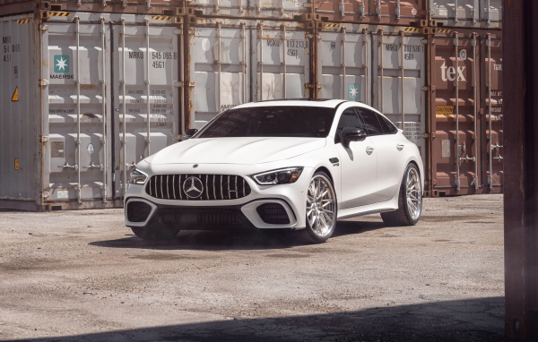 White car Mercedes-AMG GT 63 S stands at containers