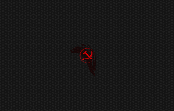 Красный серп и молот на сером фоне со звездами