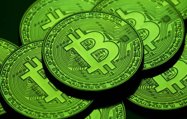 Green Bitcoin Coins Closeup