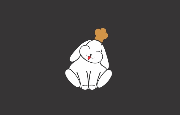 Кролик в поварской шапке на сером фоне