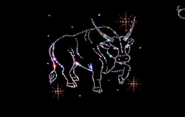 Блестящий знак зодиака телец на черном фоне