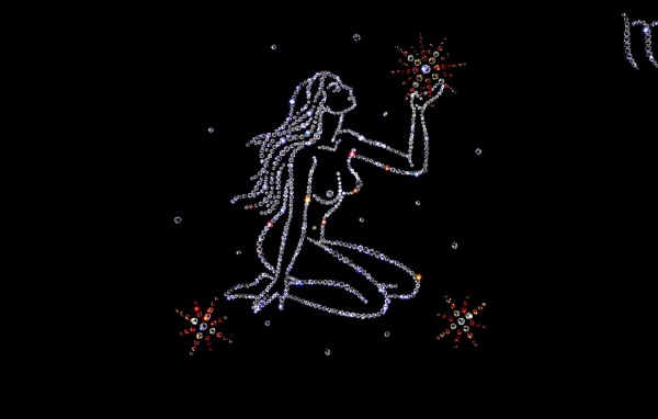 Блестящий знак зодиака дева на черном фоне