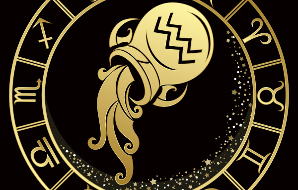 Золотой знак  зодиака водолей на черном фоне