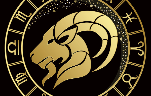 Золотой знак зодиака козерог на черном фоне