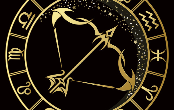 Золотой знак зодиака стрелец на черном фоне