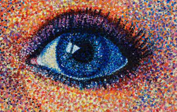 Нарисованный краской глаз девушки